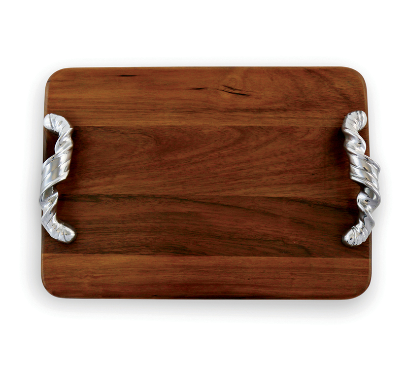 Brown Soho cutting board with silver ribbon handles from Beatriz Ball
