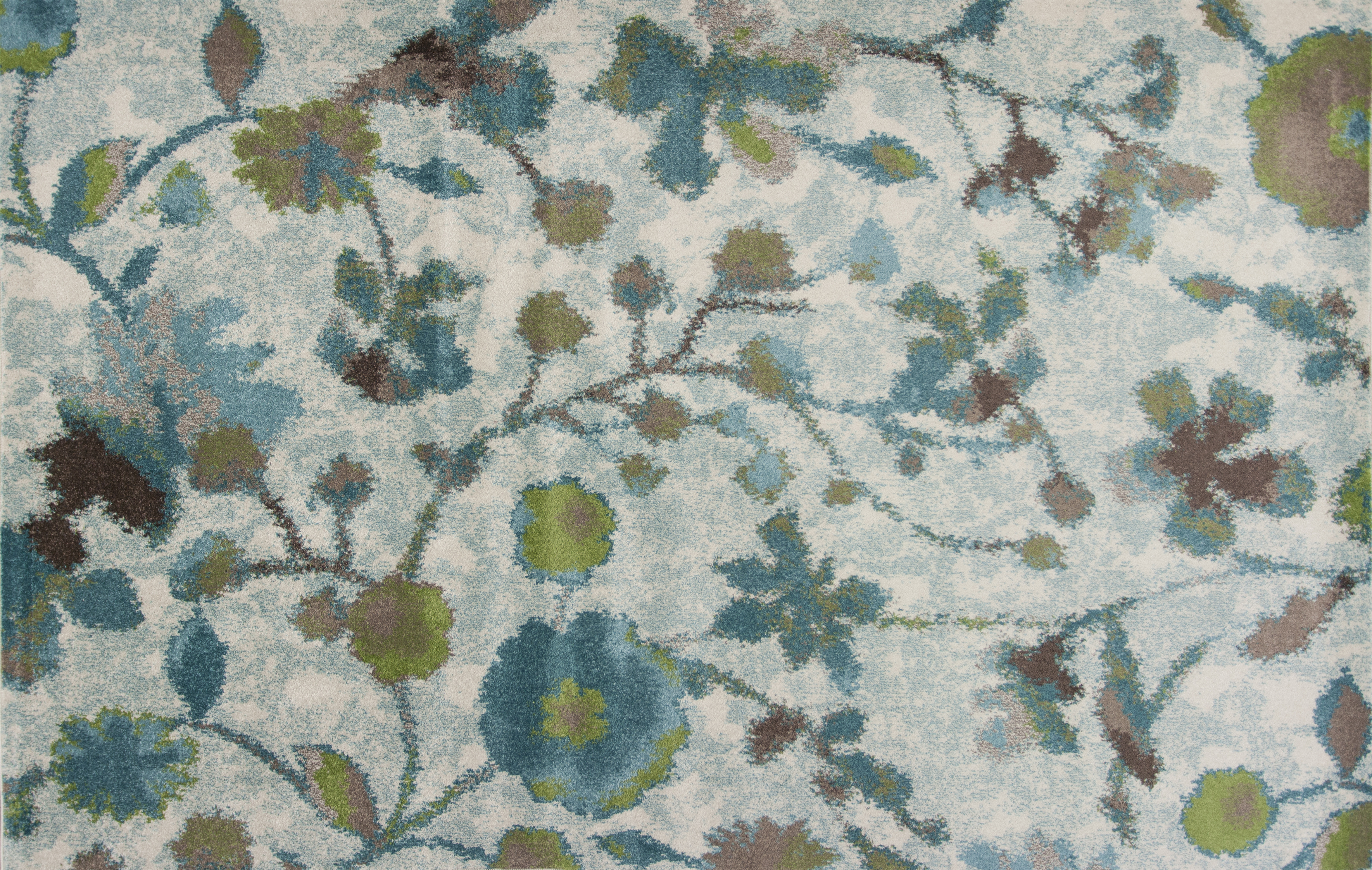 Stella area rug with floral patterns and teals and greens from KAS