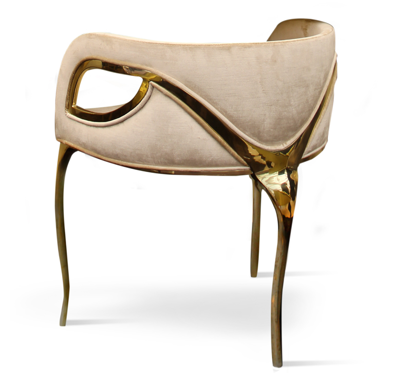 Chandra accent chair with slim gold arms and legs and black velvet seating from Koket