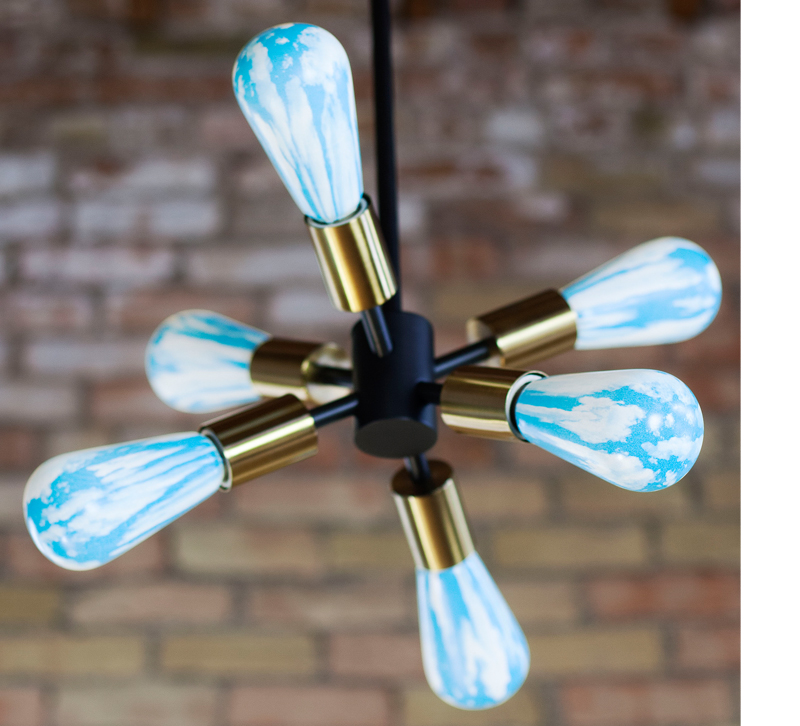 Sputnik chandelier with blue marble printed light bulbs