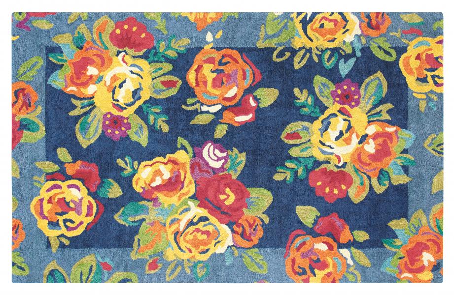 The Cabbage Roses rug from Company C delights with colorful bouquets bursting on an indigo ground. This 100 percent jute rug is hand-tufted in a dense loop-pile construction and tip-sheared for extra texture. www.companyc.com