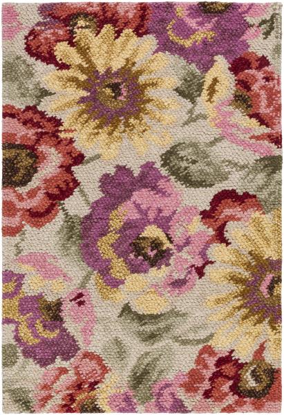Spring Bloom low-pile area rug with shades of coral, eggplant and rust on a gray background from Surya
