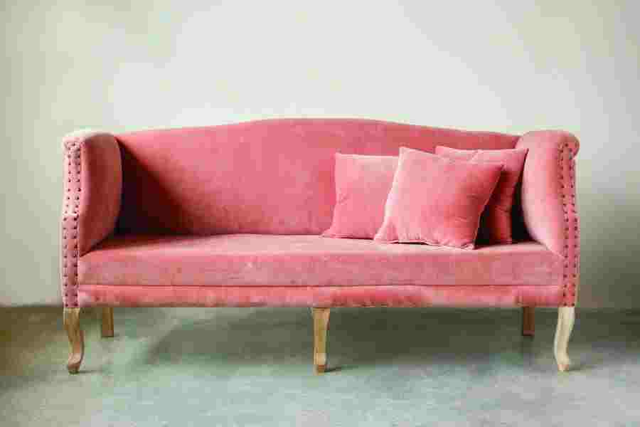 Creative Co-op: Following the Millennial pink trend, this sofa is  cotton velvet and soft to the touch. Comes with three pillows and measures 72 inches in length. C712. www.creativecoop.com