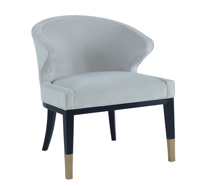 Curvey backed Countess accent chair in light blue with black legs and brass accents from Chaddock