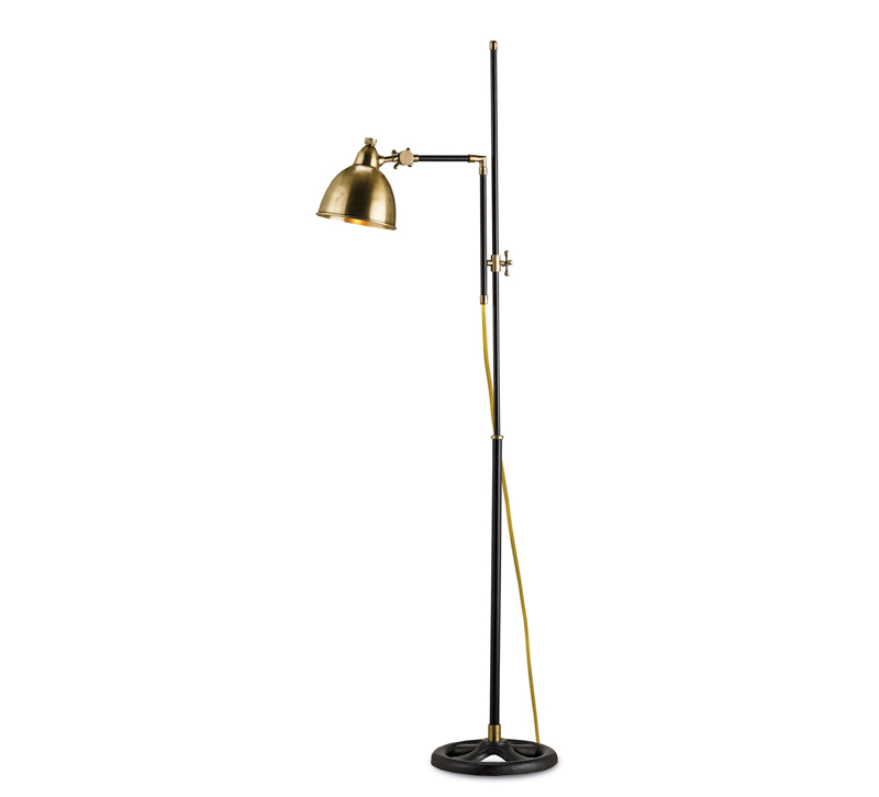 Drayton floor lamp with a black base and brass accents and shade from Currey & Co.