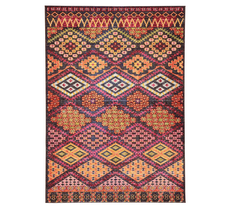 Bennelo area rug with a brightpink pallette and floral patterns from Jaipur Living