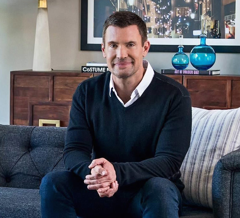 Jeff Lewis sitting on couch