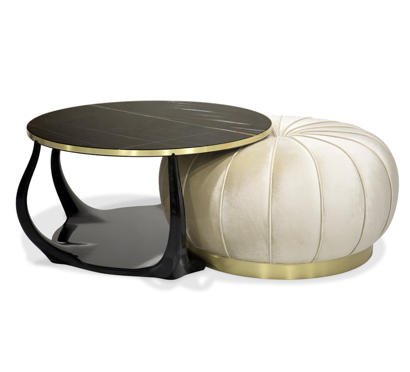 Embrace black coffee table with cream, rounded ottoman nestled under it from Koket