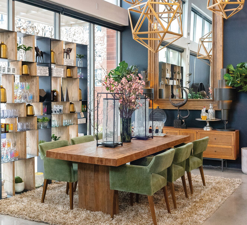 Dining table and bookcase in Lulu's Furniture and Design showroom in Denver, CO