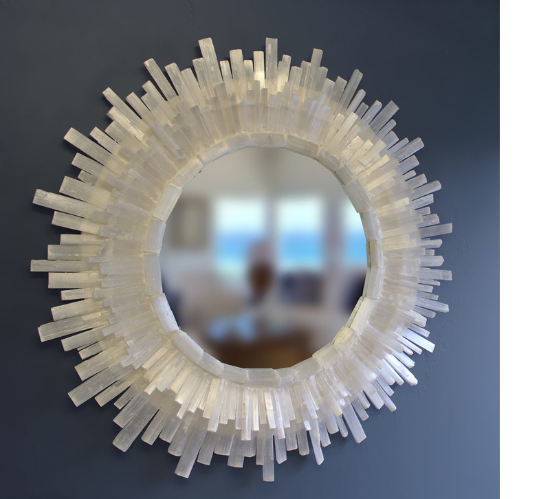 Selenite starburst mirror with selenite accents from Nate Ricketts Design