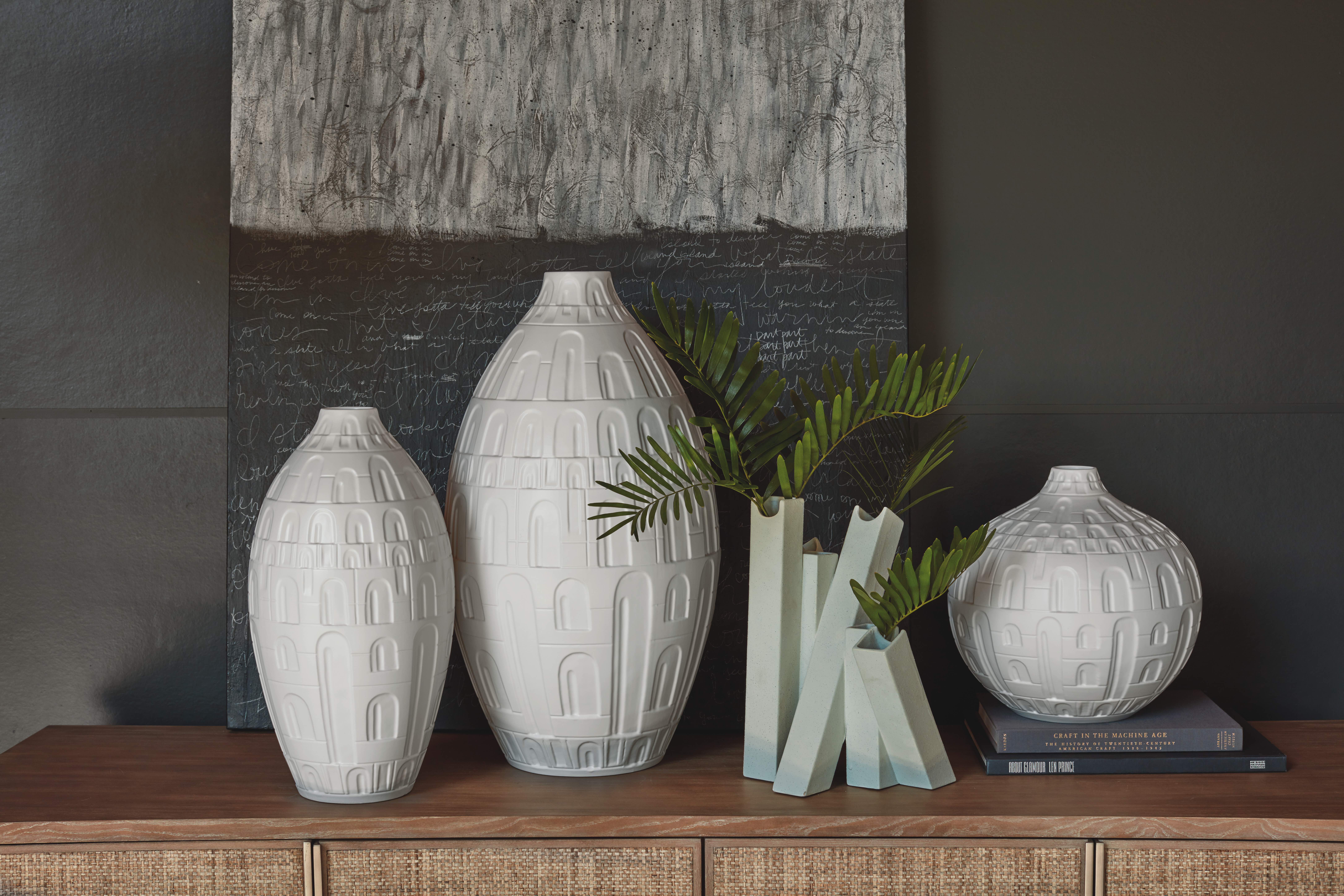 Hand-cut Coliseum Collection vases in white from Studio A Home
