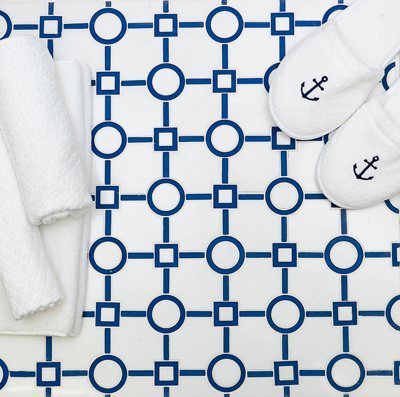 Take the Plunge floor tile with blue circles and squares on a white background from TileBar