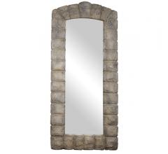 Keystone Arch Mirror with a gray, stone frame from Uttermost