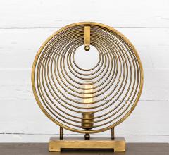 Rowan table lamp with circular design in Antique Gold from Four Hands