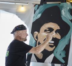 Dale Henry painting a portrait of Frank Sinatra