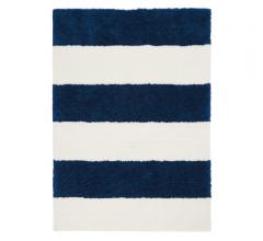 Calvin Klein Wicker Park Shag Area Rug with navy and white stripes from Nourison