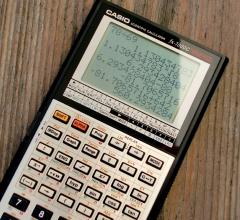 Calculator on wooden table