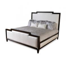Aldrich King Bed with an upholstered headboard and base in white fabric with dark wood framing from Taylor King