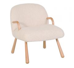 Cozy Chair with faux sheepskin fabric and light brown splayed legs and rounded arms from Norwalk Furniture