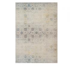 Ella Rose Area Rug with a floral pattern in beige with bits of blue from Loloi Rugs