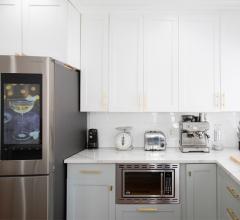 Hi-tech contemporary kitchen with smart refrigerator