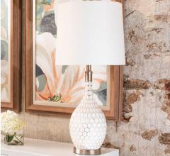 StyleCraft white table lamp on white chest