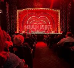 This simple set for Moulin Rouge became a spectacular 3-dimensional backdrop for the show through the use of LED theatrical lighting.