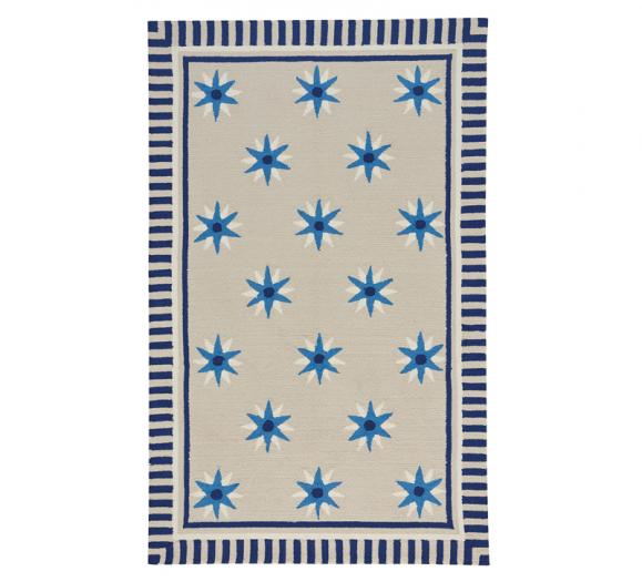 Compass Quilt Area Rug on a beige background with blue and white stars from Capel Rugs