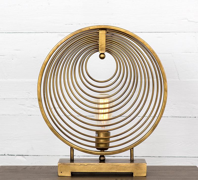 Rowan table lamp with circular design in Antique Gold from Four Hands