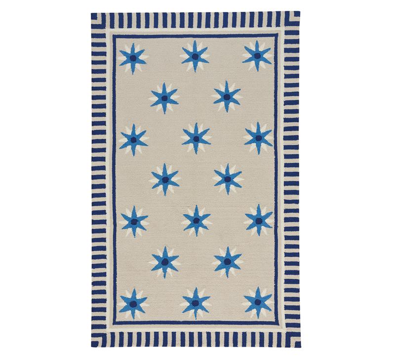 Compass Quilt Area Rug on a beige background with blue and white stars from Capel Rugs
