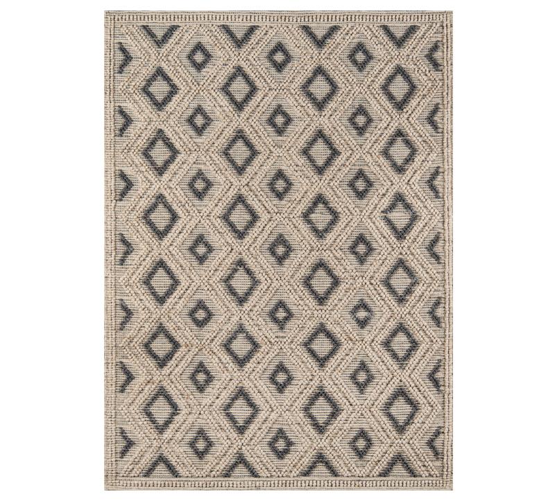 Andres Area Rug with a beige diamond pattern from Momeni