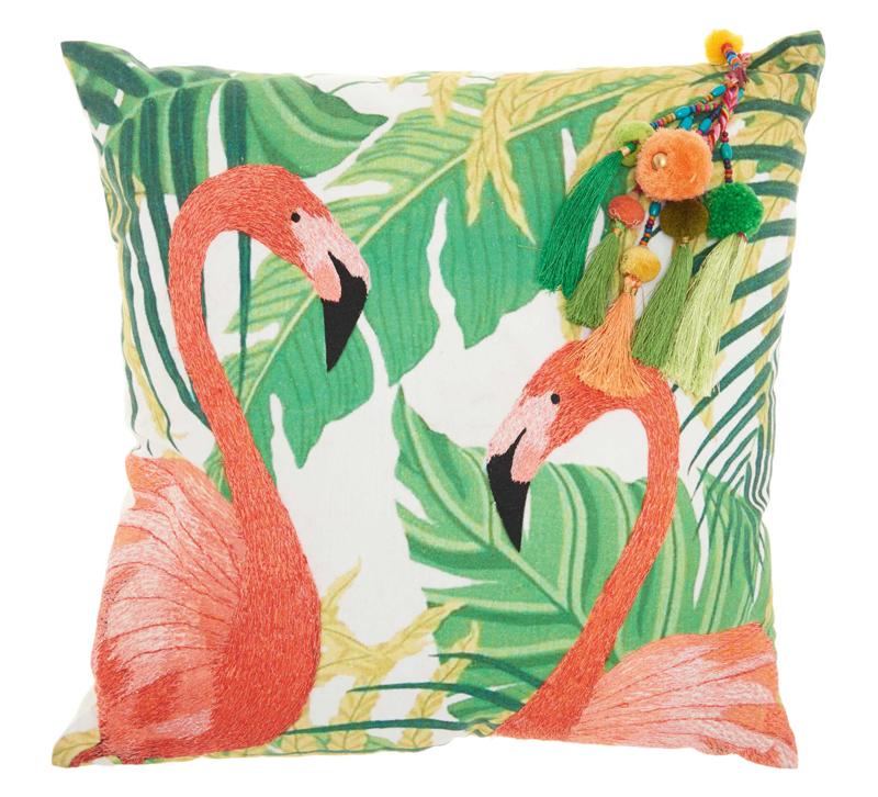 Royal Palm Pillow will two flamingos on it in front of palm leaves with a tassel on the side from Nourison