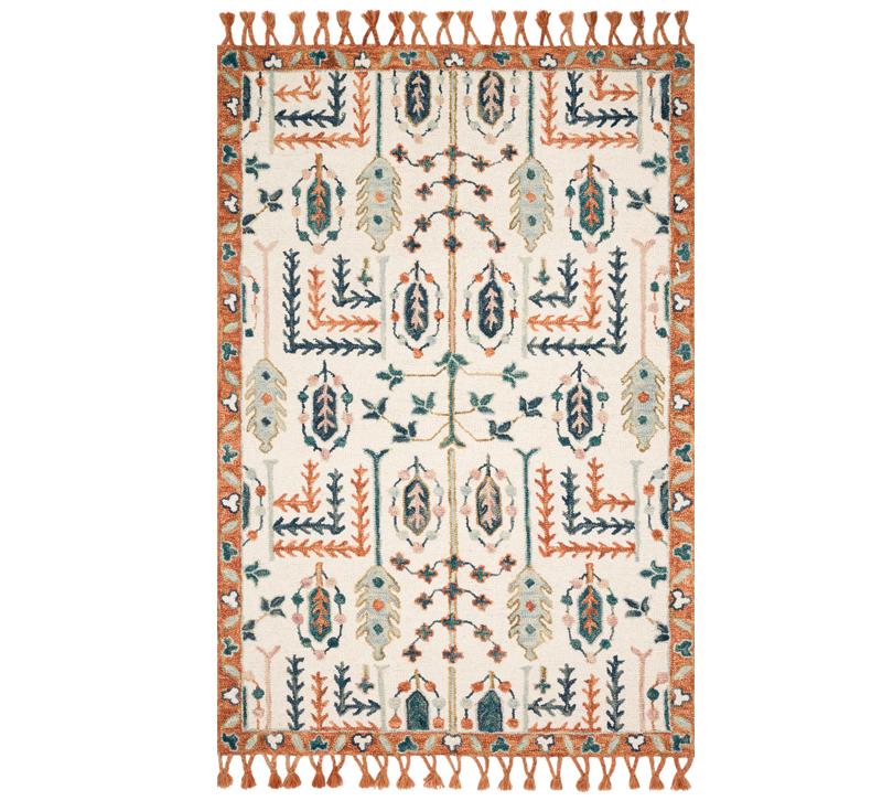Kasuri Ivory/Persimmon Area Rug with an orange border and tassels from Loloi Rugs