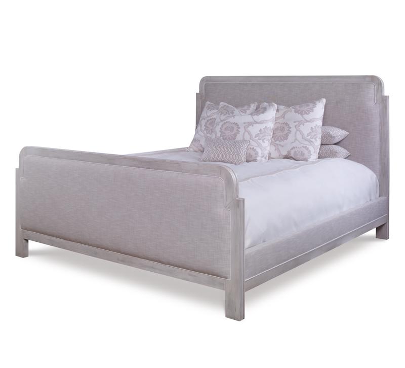 Cameron upholstered bed with a light wood-finished frame and gray fabric from Chaddock Home