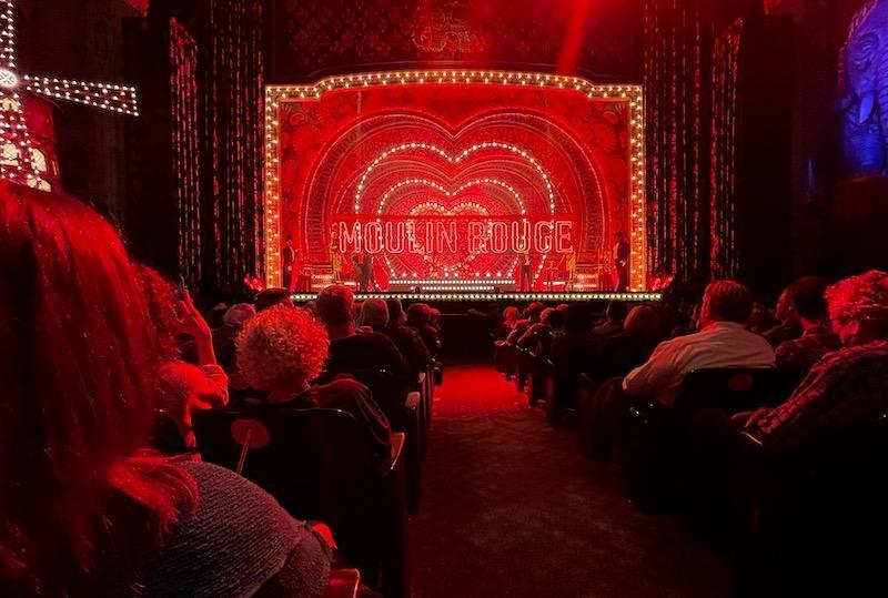 This simple set for Moulin Rouge became a spectacular 3-dimensional backdrop for the show through the use of LED theatrical lighting.