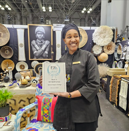 Rose Luangisa accepting the Social Impact Design Award at NY Now