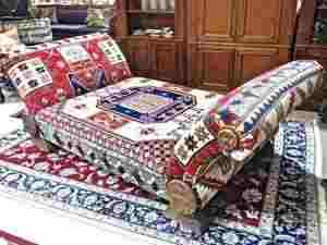 Baileywyck Antiques daybed/chaise upholstered with Afghan Zazak vegetable-dyed textiles