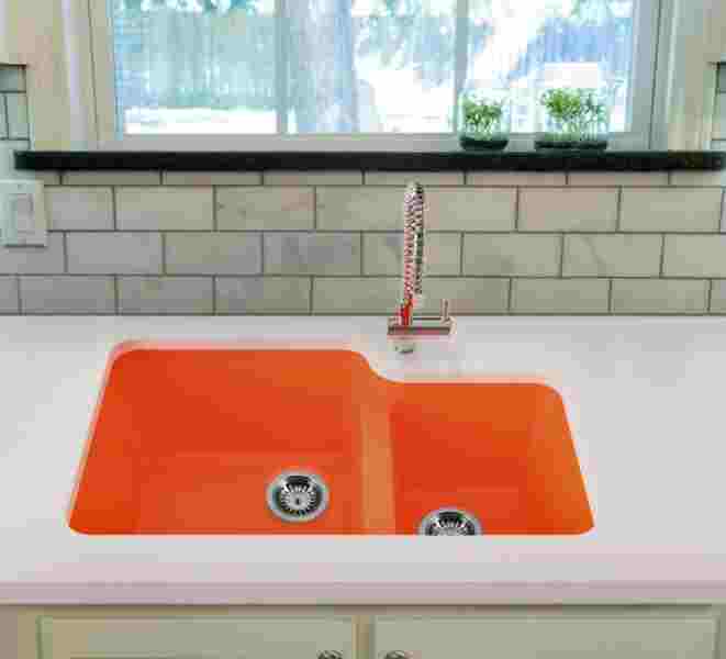 This year, Whyte & Company will also be releasing a line of farmhouse sinks - something Vance is particularly excited about. The new sinks will join this Mario kitchen sink in Tangerine as part of the kitchen collection.