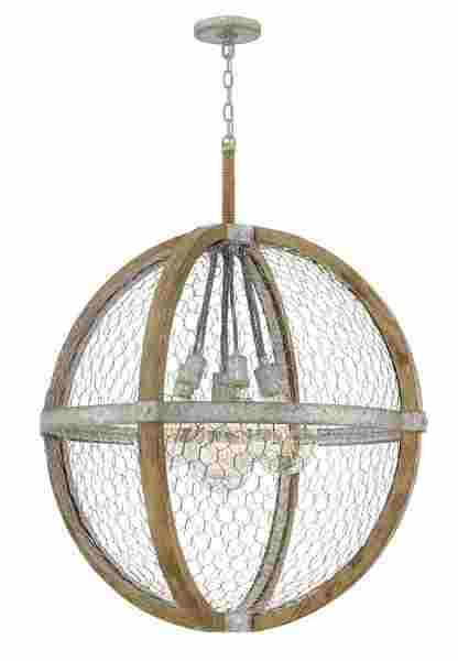 In Hinkley’s Heywood pendant, globe-style vintage bulbs are a chic focal point, and the layers of wood, Weathered Zinc metal and rope create a dynamic look. www.hinkleylighting.com