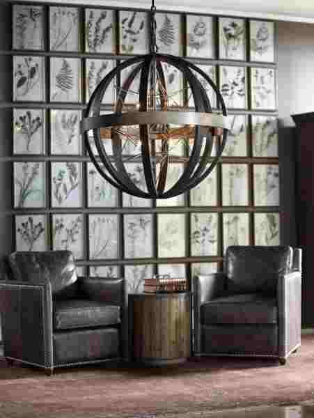 From Uttermost’s Revelation line, Polaris fixture comes in a Distressed Textured Bronze finish featuring a stained washed wood center band, all surrounding an interior brushed nickel eight-light geometric star. www.uttermost.com