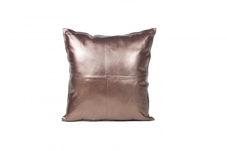Auskin: This pillow’s metallic four-square cushion adds a touch of glitz. The fabric is cowhide — single-sided leather — filled with a down feather filler. C524C. www.auskin.com