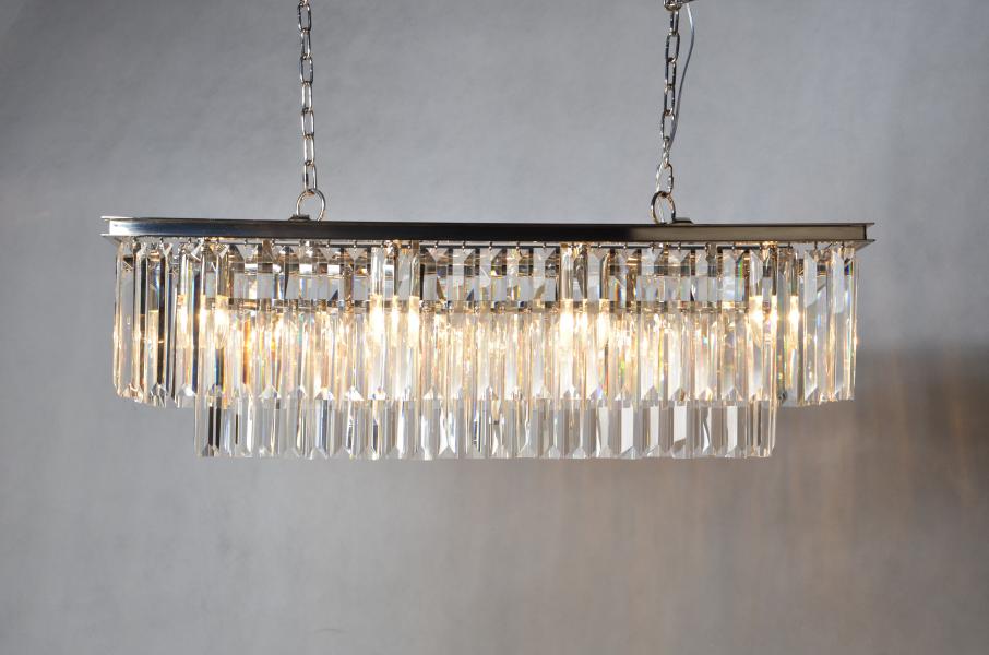 Meva: Glamorous and elegant, the Chloe linear chandelier stretches 17 inches in diameter. The chandelier is painted Antique Black and polished with an Iron finish. B162. www.meva.us
